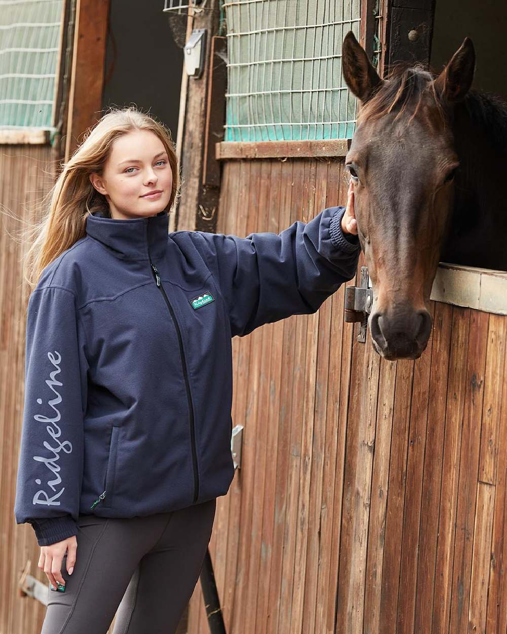Navy Coloured Ridgeline Womens Brumby Yard Jacket on stable background 