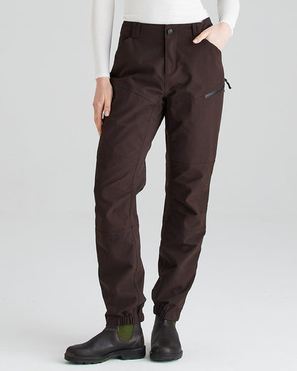 Deep Bark coloured Ridgeline Womens Cambrian Trousers on grey background 