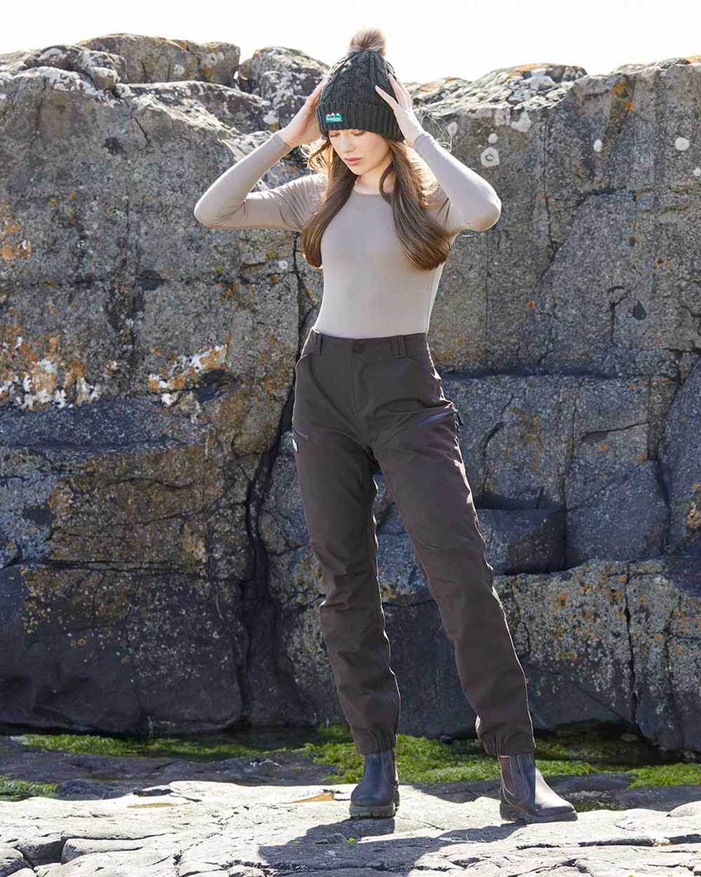 Deep Bark coloured Ridgeline Womens Cambrian Trousers on rocky background 