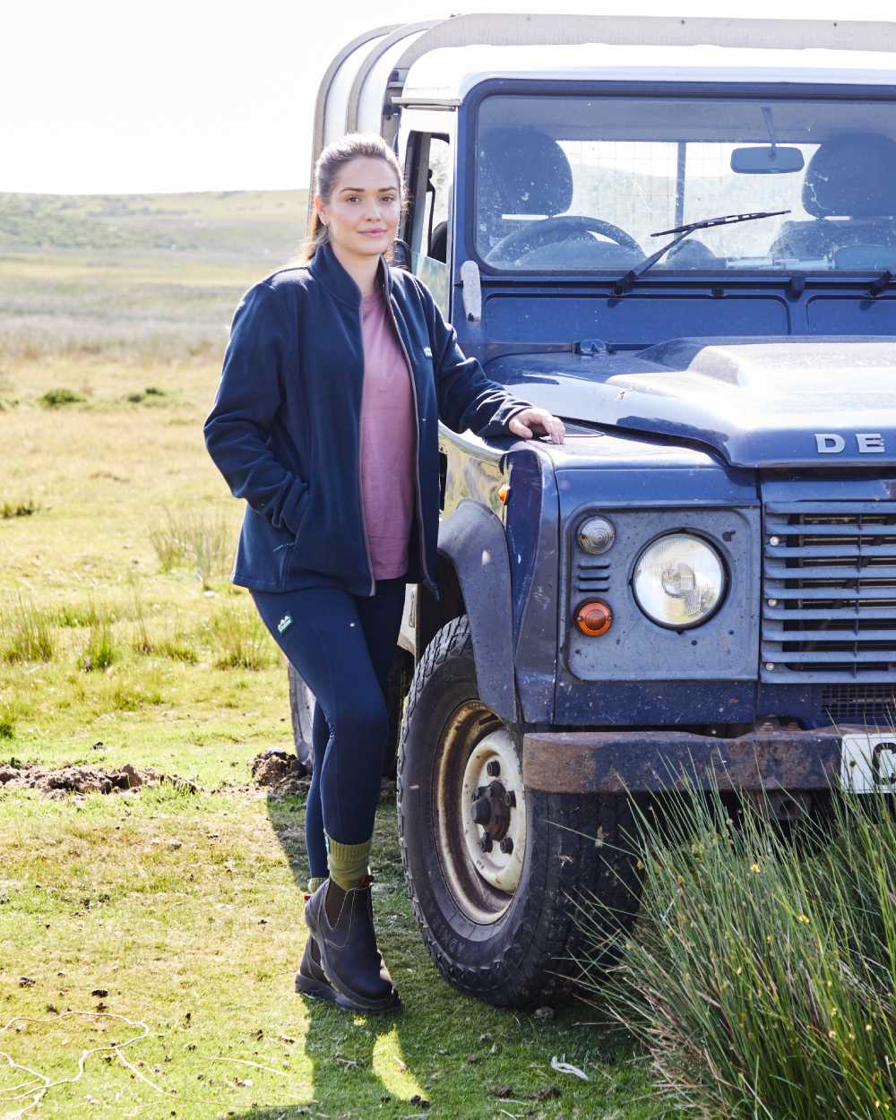 Navy coloured Ridgeline Womens Infinity Leggings on mountain background 