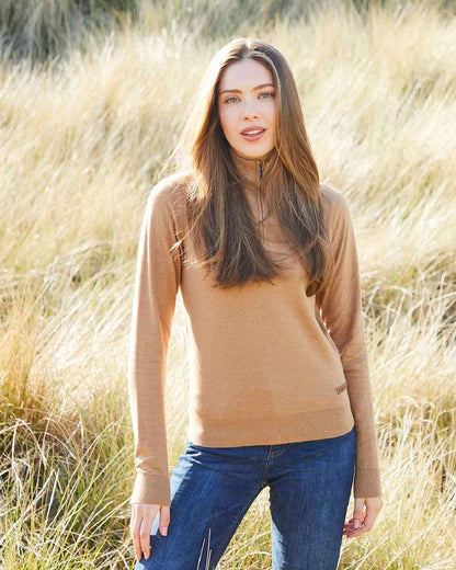 Sienna coloured Ridgeline Womens Melford Knit 1/4 Zip Jumper on field background 