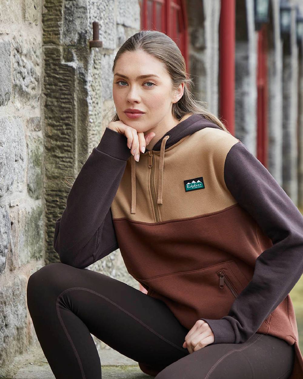 Nutmeg coloured Ridgeline Womens Tribe Hoodie on street background 
