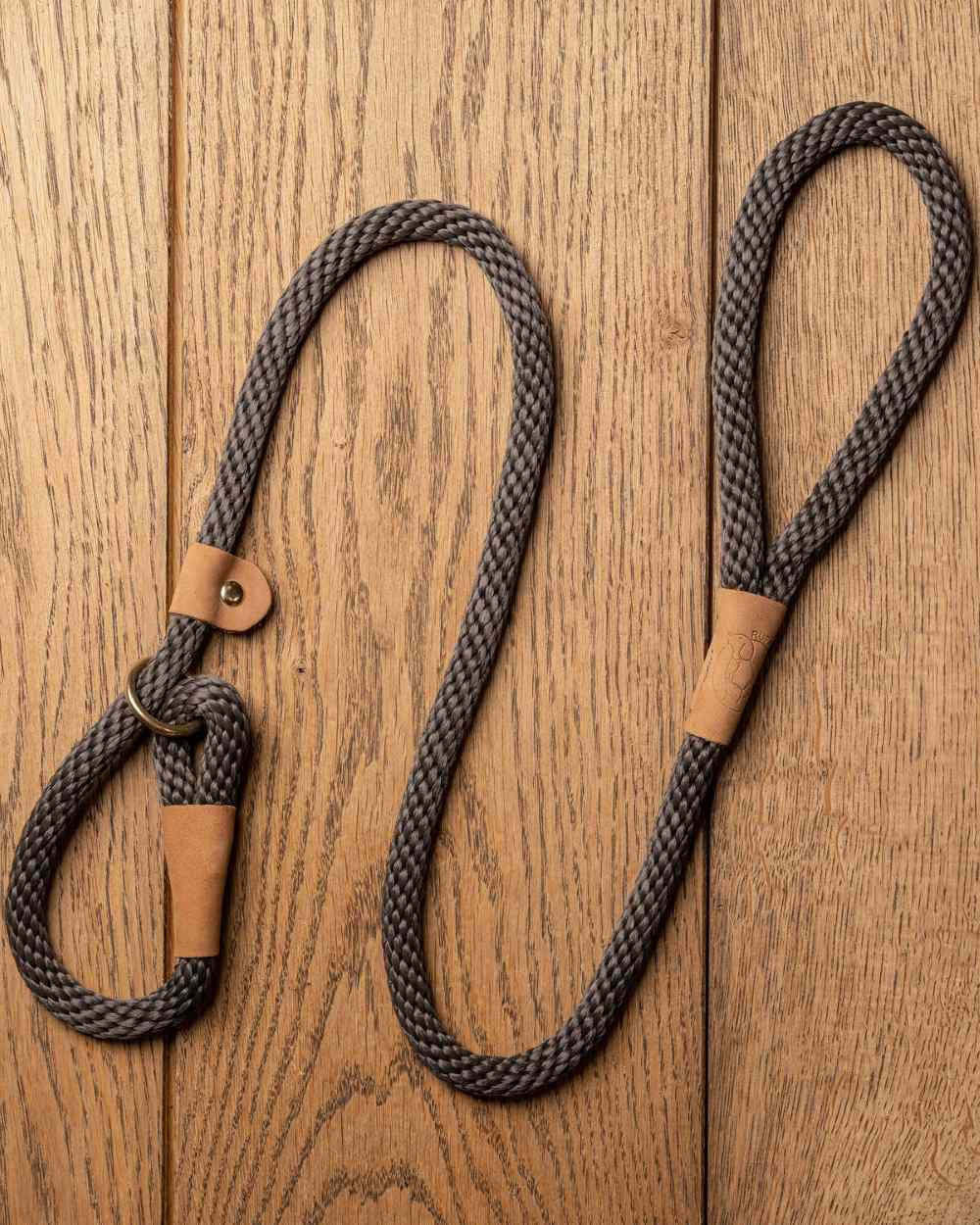 Charcoal coloured Ruff &amp; Tumble Dog Clip Leads on laminate background 