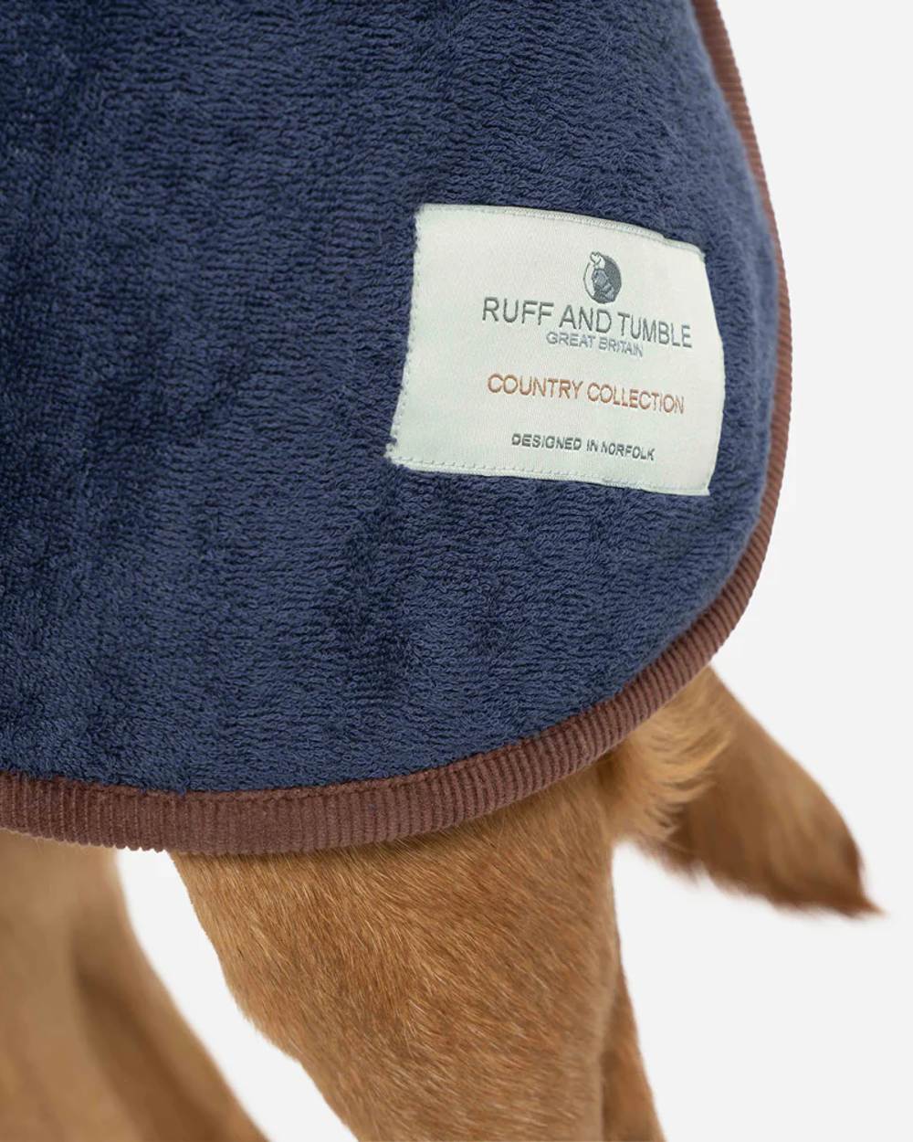 French Navy coloured Ruff &amp; Tumble Country Dog Drying Coat on ginger dog on white background 