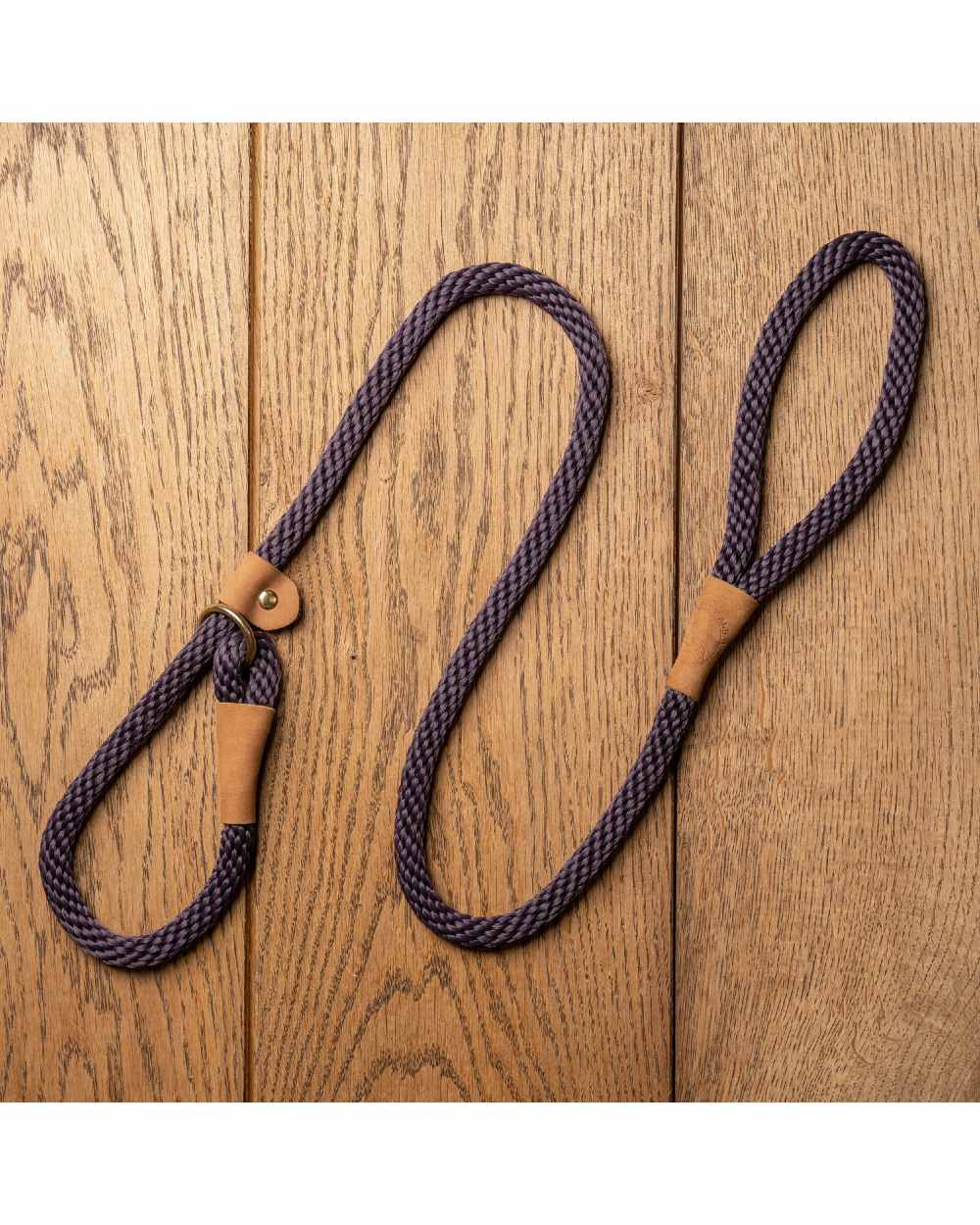 Blackberry coloured Ruff &amp; Tumble Slip Dog Leads on wooden background 