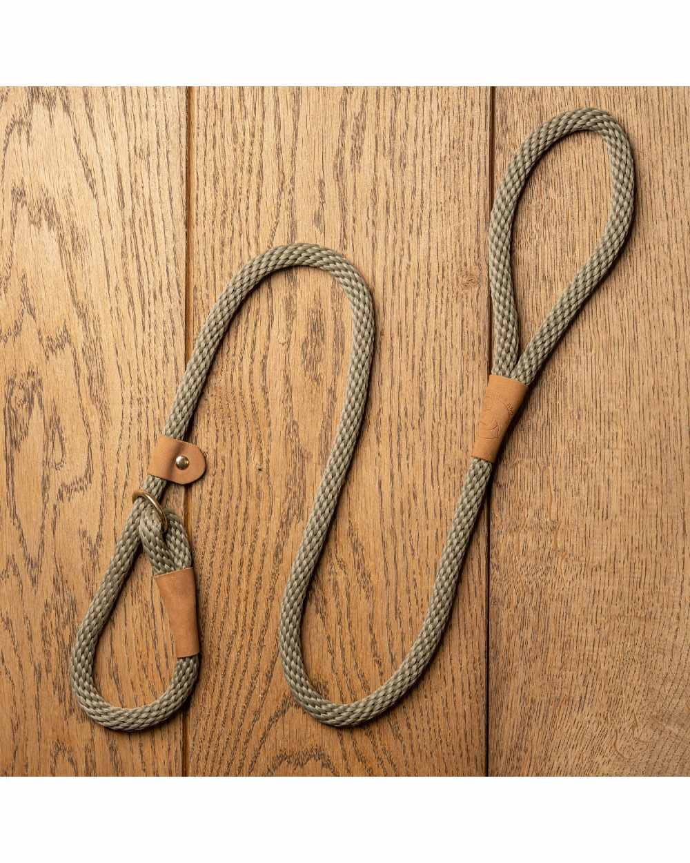 Moss coloured Ruff &amp; Tumble Slip Dog Leads on wooden background 