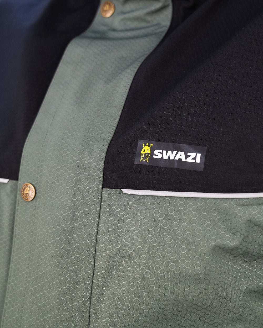 Sage/Black Coloured Swazi Torrent Jacket On A White Background 