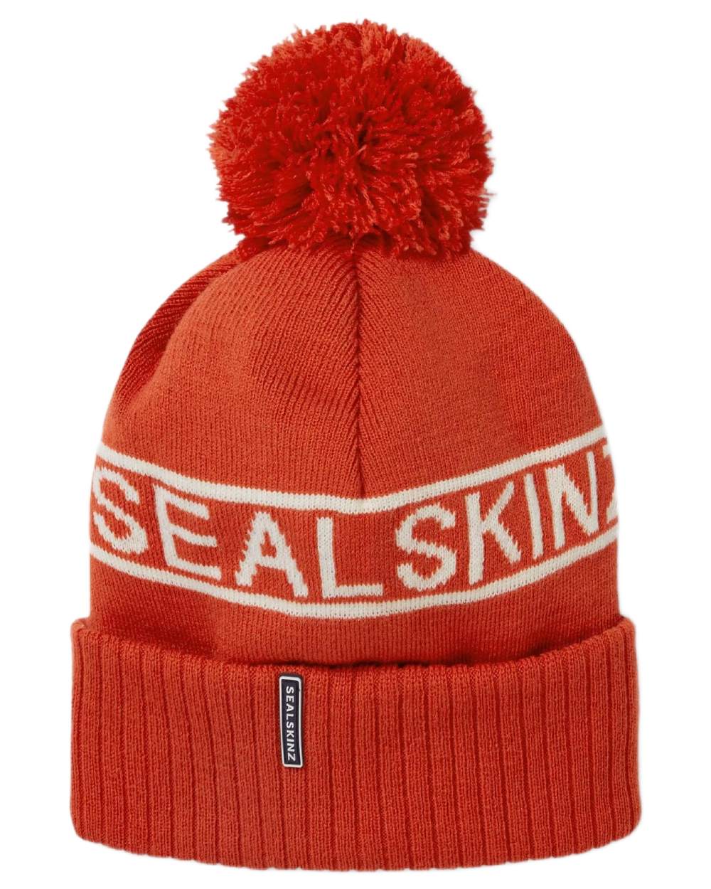 Orange coloured Sealskinz Heacham Waterproof Icon Bobble Hat on white background 