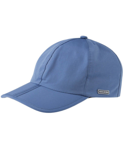 Blue coloured Sealskinz Salle Waterproof Foldable Peak Cap on white background 