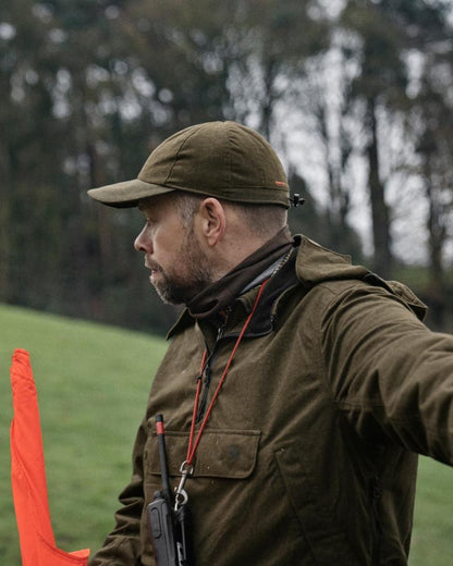 Pine Green Melange Coloured Seeland Avail Cap on forest background 