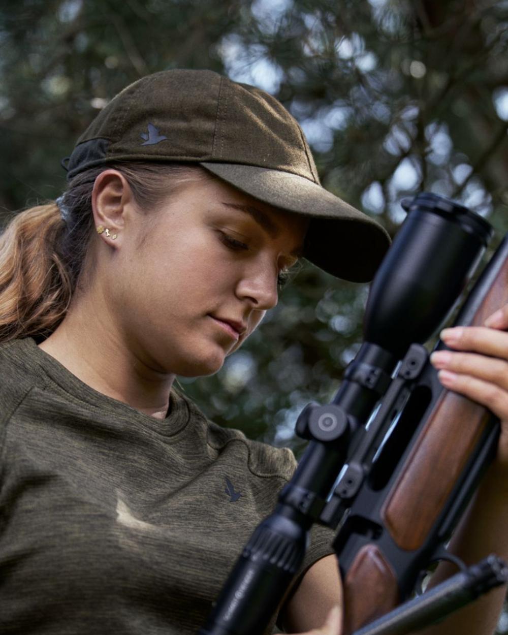 Pine Green Melange Coloured Seeland Avail Cap on forest background 