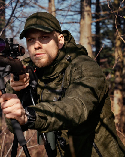 Pine Green Melange coloured Seeland Avail Jacket on forest background 