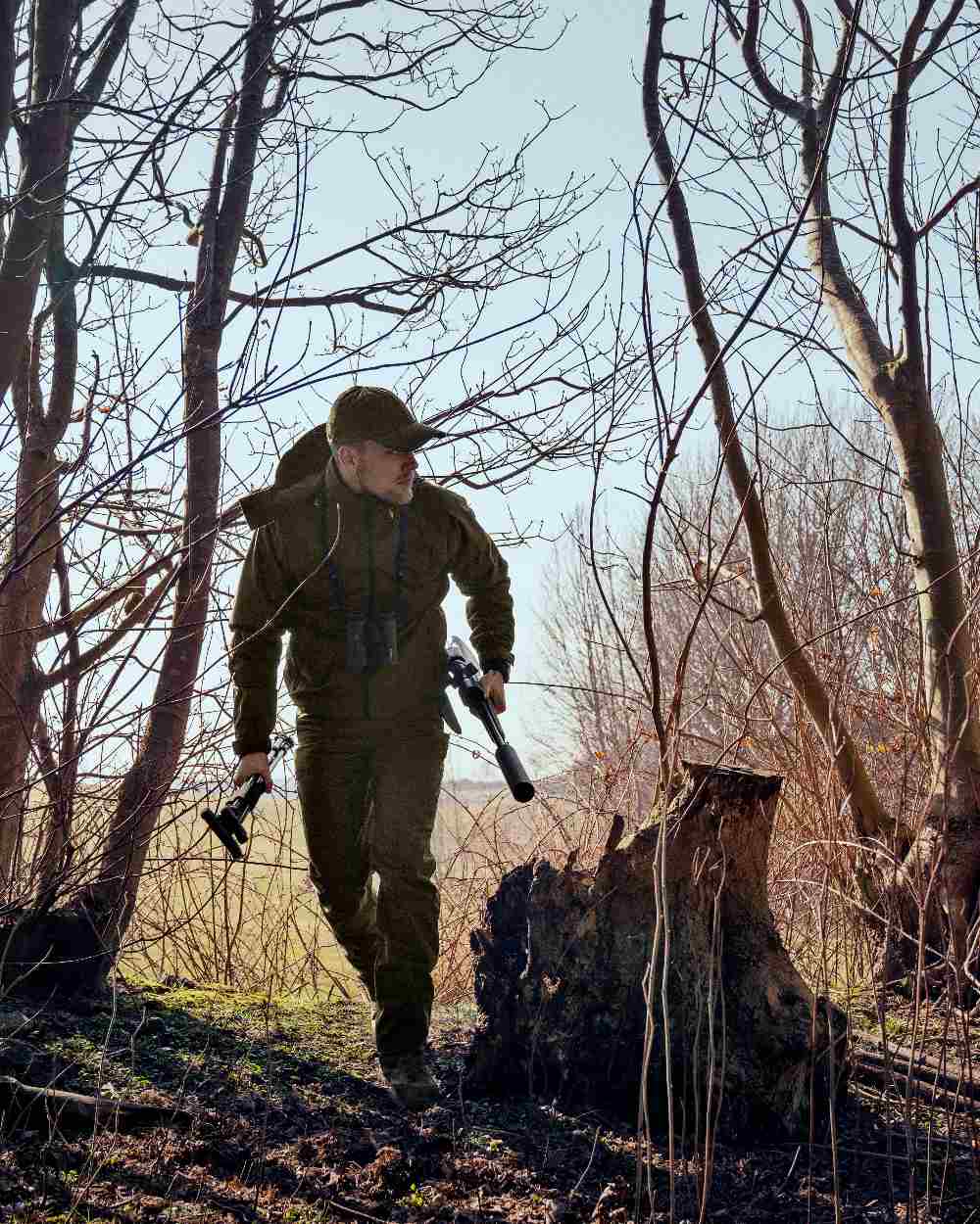 Pine Green Melange Coloured Seeland Avail Trousers on forest background 