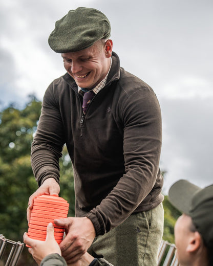 Pine Green Coloured Seeland Benjamin Half Zip Fleece on outdoor background 