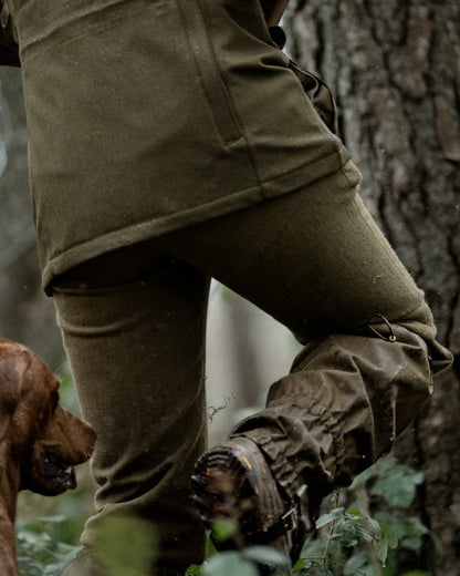 Shaded Olive coloured Seeland Buckthorn Duro Gaiters on forest background 