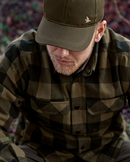 Green Check Coloured Seeland Canada Quilted Shirt on forest background 