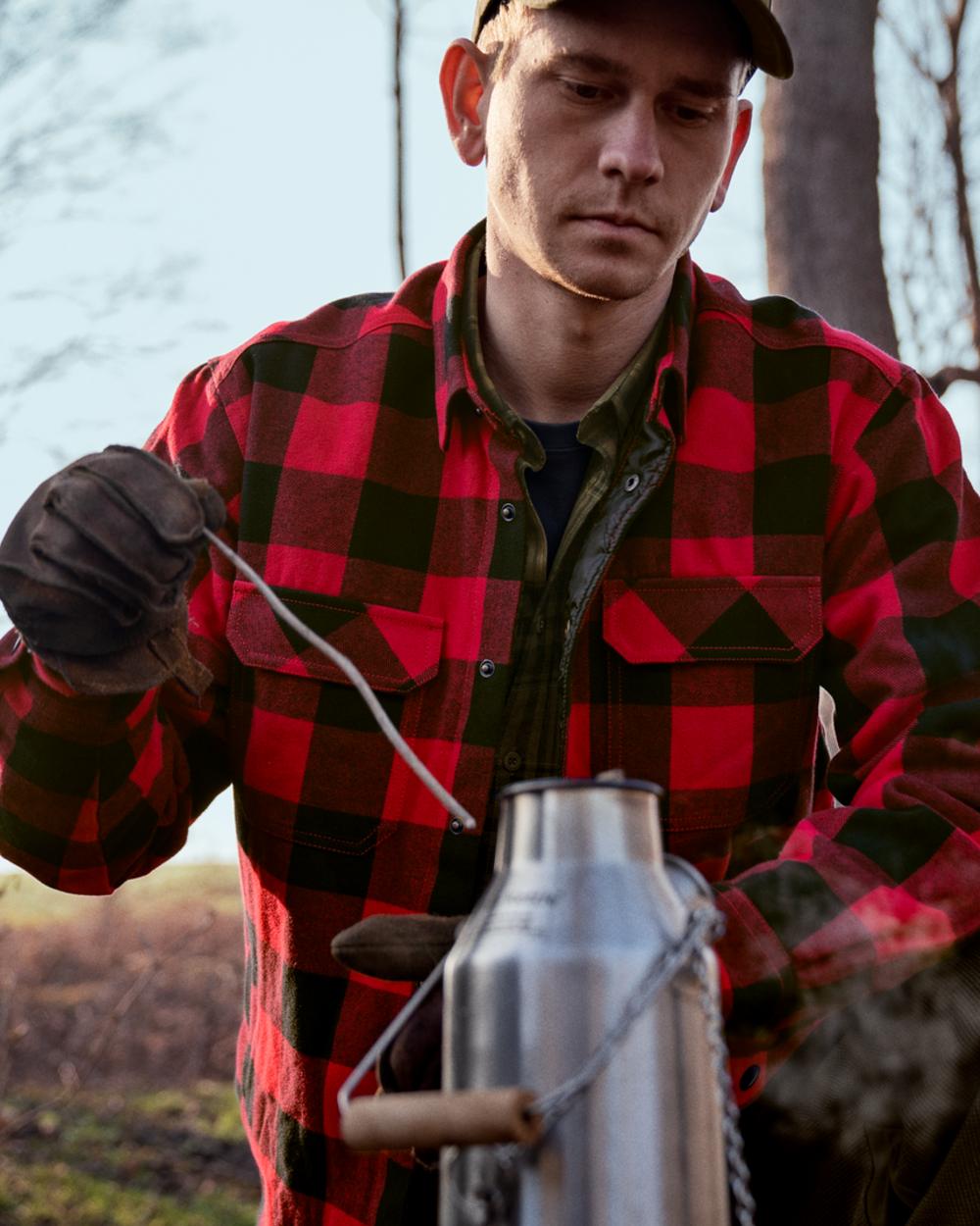 Red Check Coloured Seeland Canada Quilted Shirt on forest background 