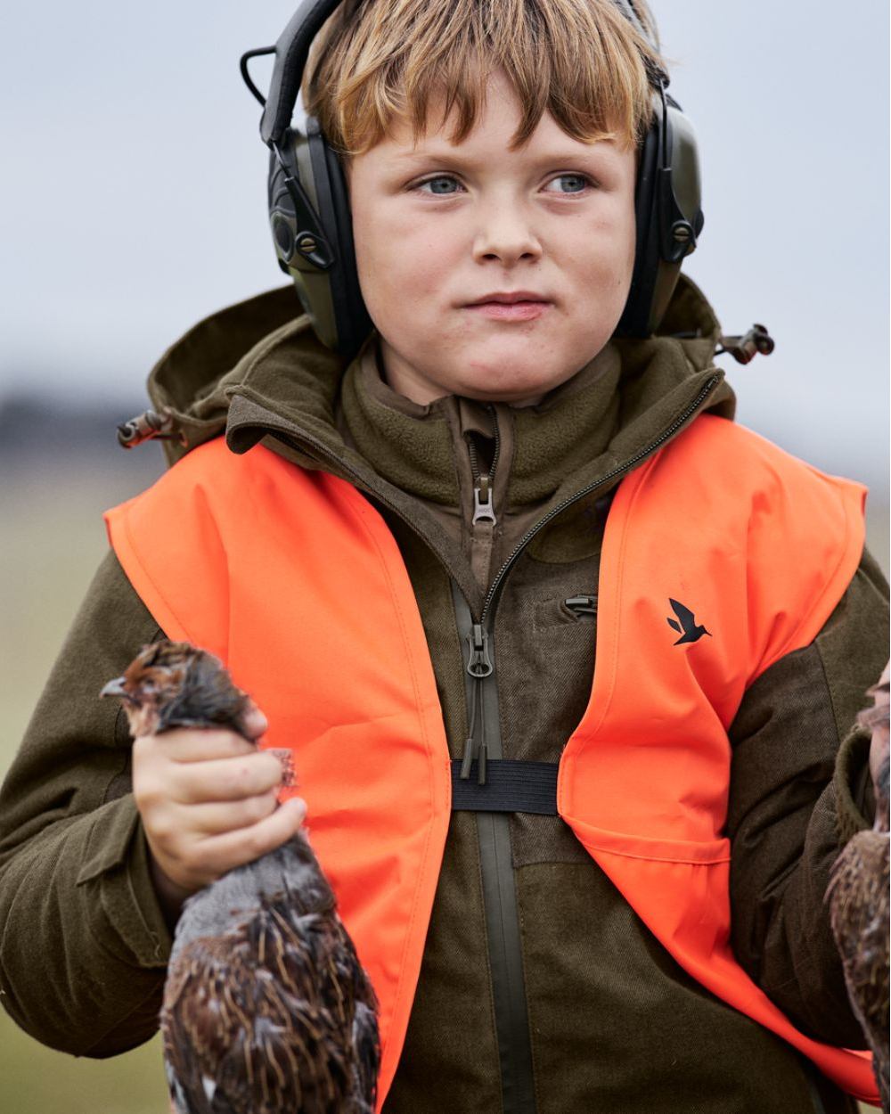 Pine Green Melange Coloured Seeland Childrens Avail Jacket on outdoor background 