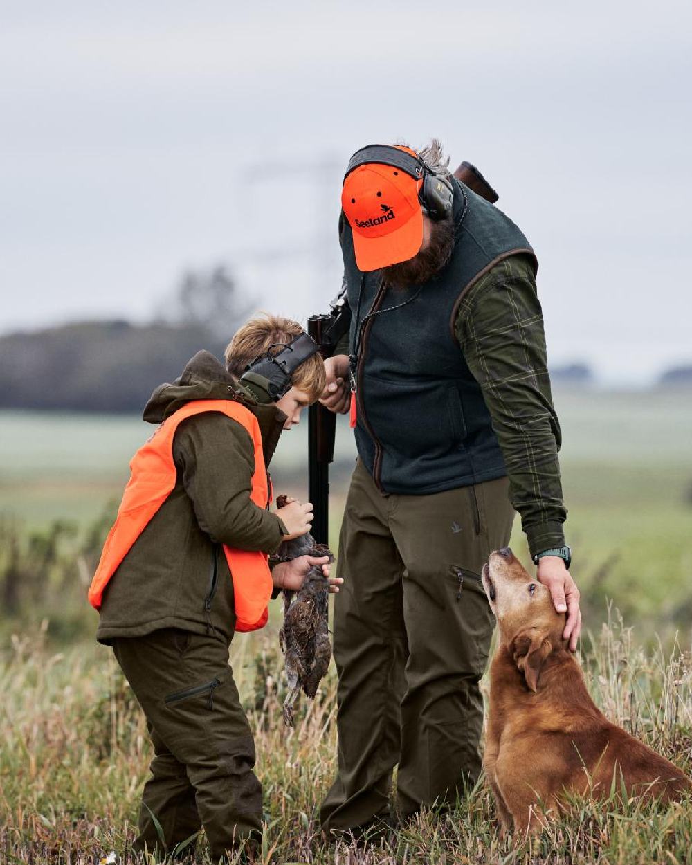 Pine Green Melange Coloured Seeland Childrens Avail Trousers on forest background 