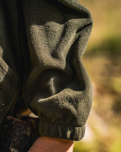 Pine Green Coloured Seeland Childrens Benjamin Fleece on outdoor background 