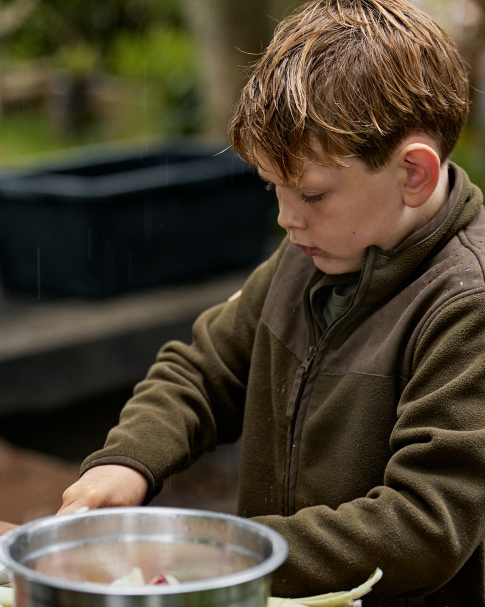 Pine Green Coloured Seeland Childrens Bolt Fleece Jacket on outdoor background 