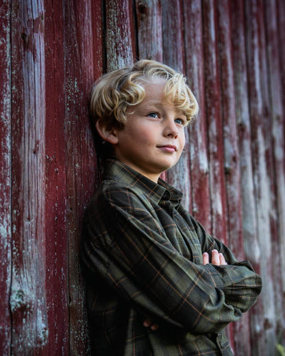 Pine Green Dark Navy Check Coloured Seeland Childrens Glen Flannel Shirt on outdoor background 