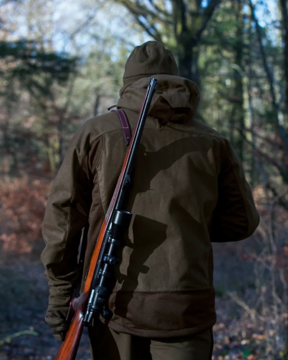 Pine Green Coloured Seeland Climate Hybrid Jacket on outdoor background 