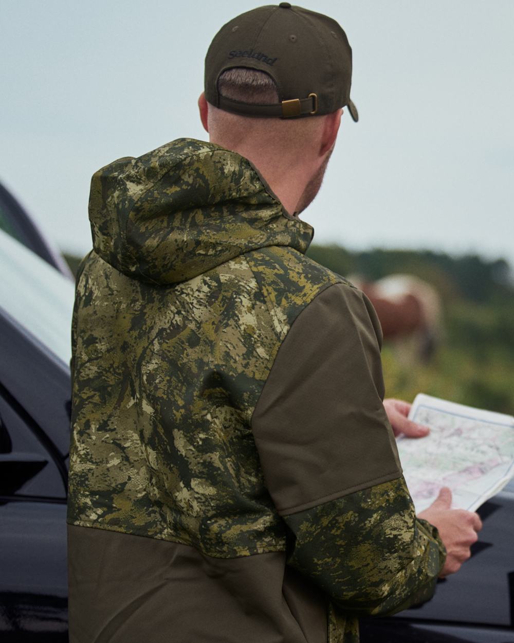 InVis Green Coloured Seeland Cross Windbeater Jacket on outdoor  background 