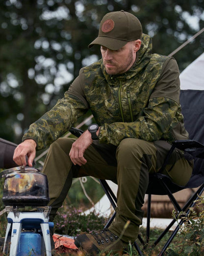 InVis Green Coloured Seeland Cross Windbeater Jacket on outdoor  background 