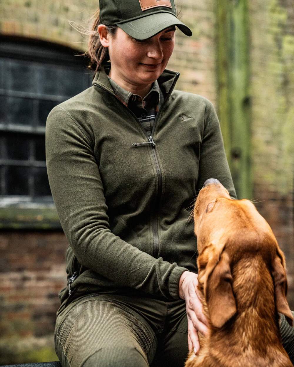 Pine Green Coloured Seeland Dew Fleece Jacket on outdoor background 
