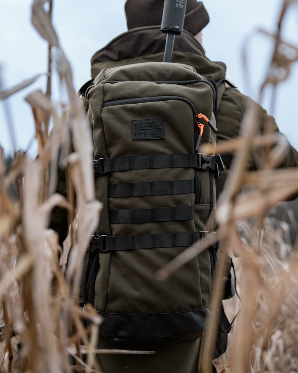 Pine Green coloured Seeland Enduro Backpack on forest background 