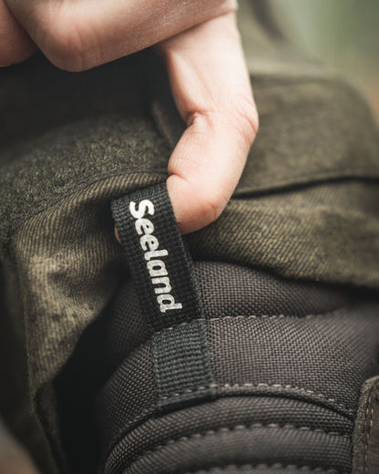 Dark Brown coloured Seeland Enduro Dial Aya Boots on forest background 