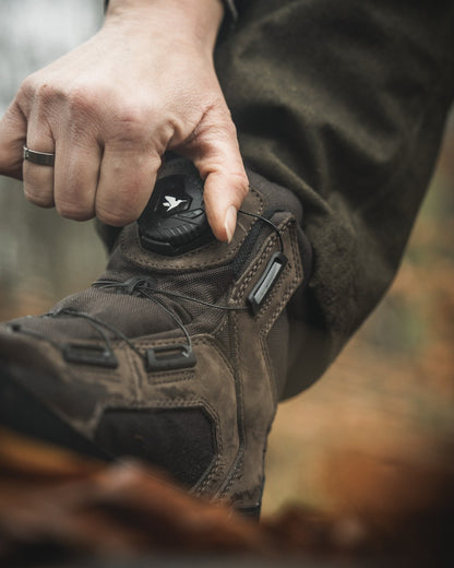 Dark Brown coloured Seeland Enduro Dial Aya Boots on forest background 
