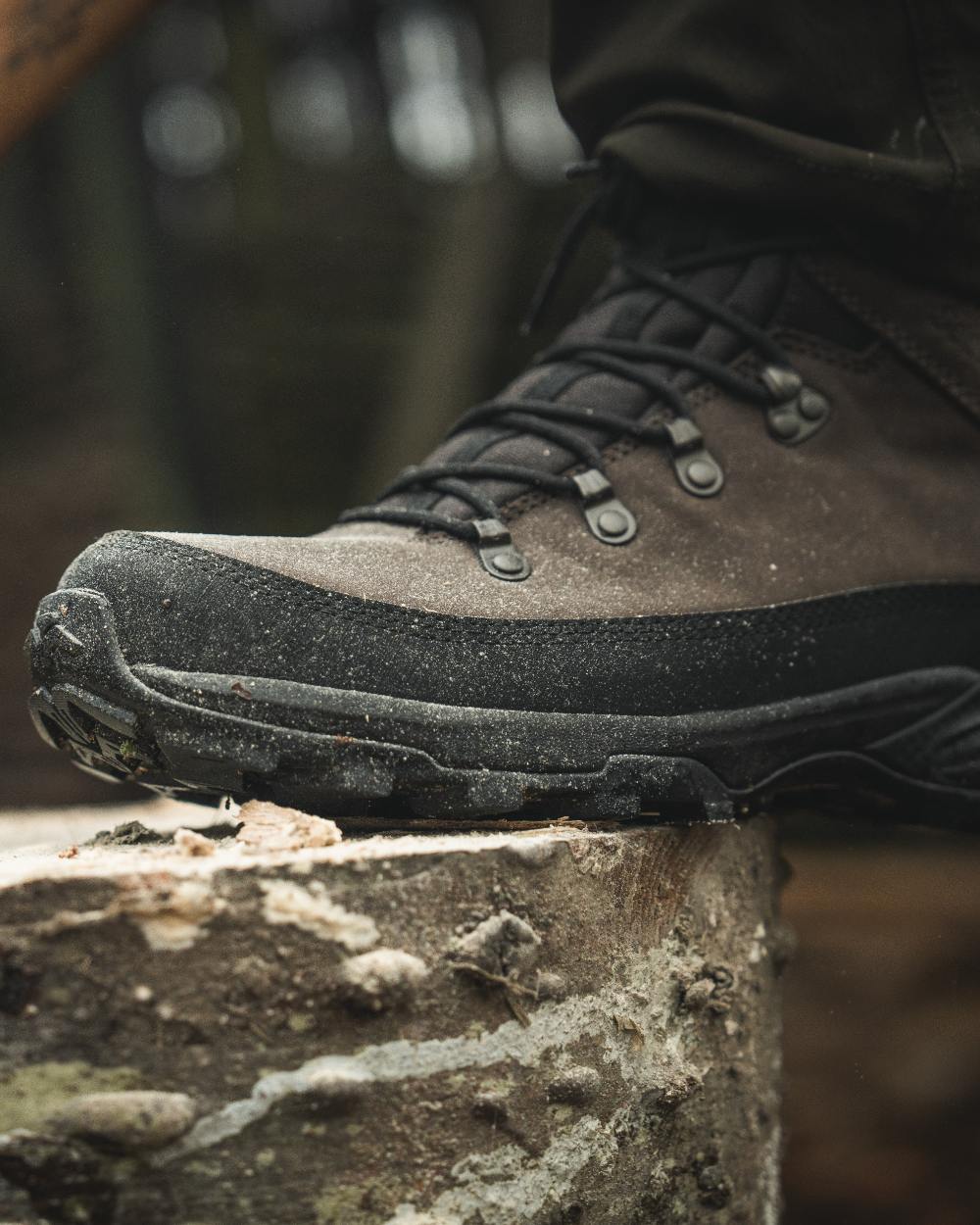 Dark Brown coloured Seeland Enduro Explore Mid Boots on forest background 