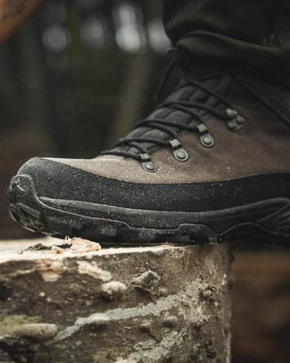 Dark Brown coloured Seeland Enduro Explore Mid Boots on forest background 