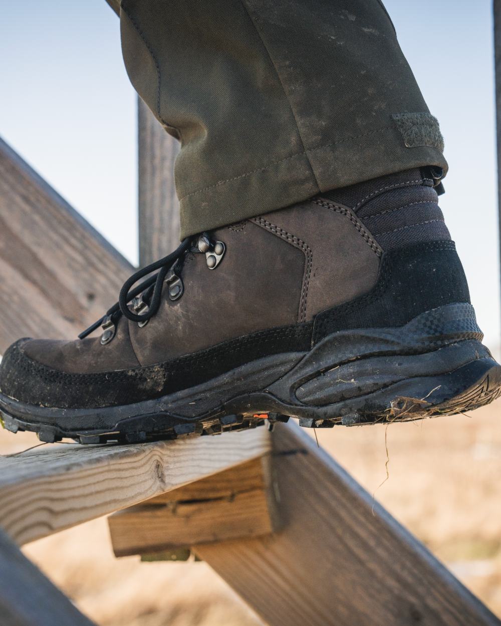 Dark Brown coloured Seeland Enduro Explore Mid Boots on outdoor background 