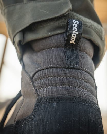 Dark Brown coloured Seeland Enduro Explore Mid Boots on outdoor background 