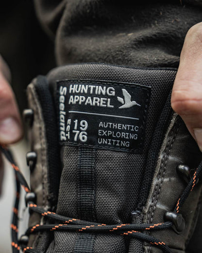 Dark Brown coloured Seeland Enduro Tracker High Boots on forest background 