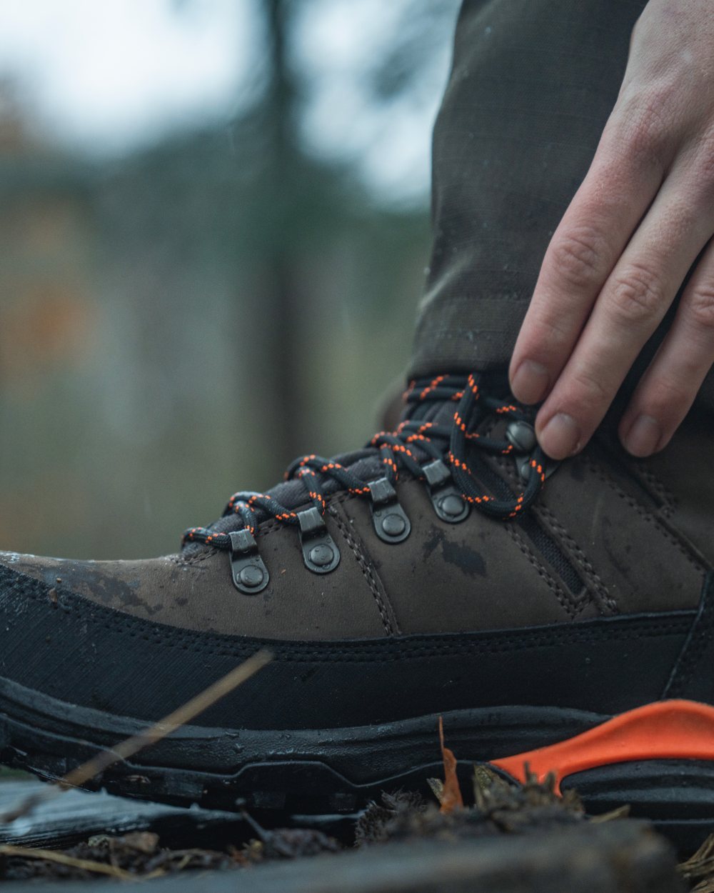 Dark Brown coloured Seeland Enduro Tracker High Boots on forest background 