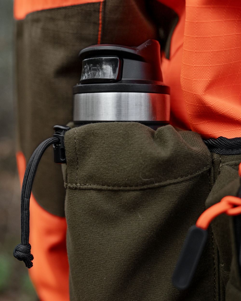 Pine Green coloured Seeland Enduro Utility Waist Pack on forest background 