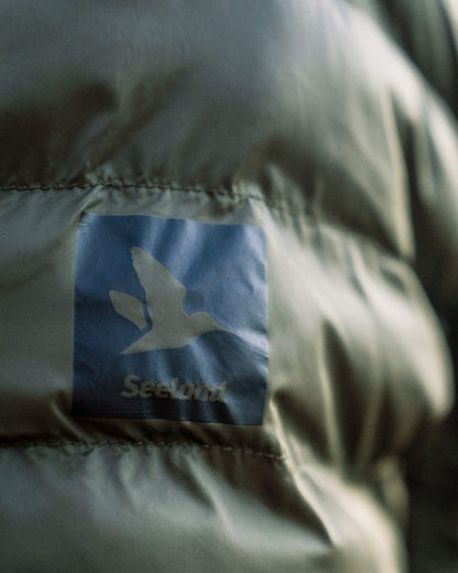 Military Olive coloured Seeland Fahrenheit Jacket on white background 