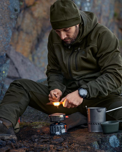 Pine Green Coloured Seeland Hawker Shell II Jacket on outdoor background 