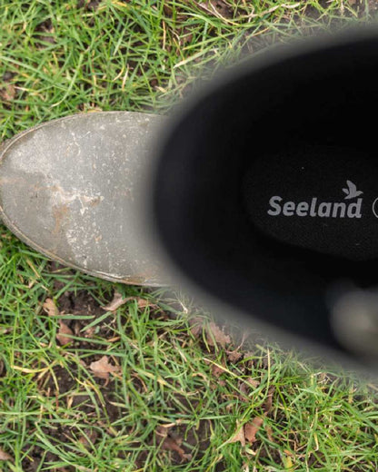 Pine Green Coloured Seeland Hillside Enforced Wellingtons on outdoor background 