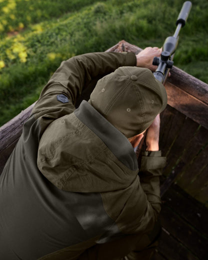 Pine Green Coloured Seeland Key-Point Active II Jacket on forest background 