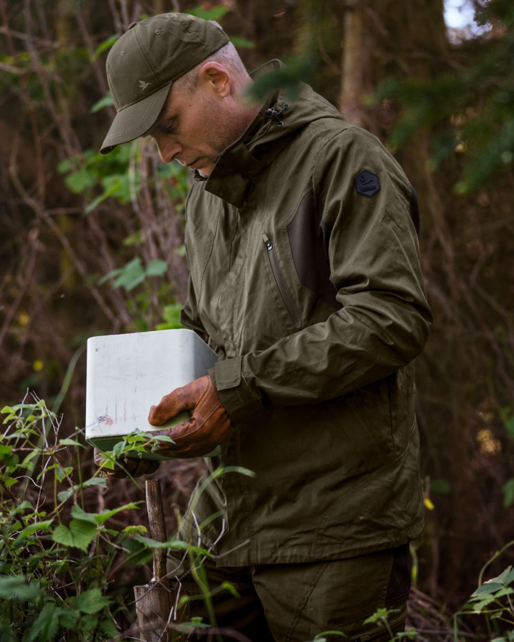 Pine Green Coloured Seeland Key-Point Active II Jacket on forest background 