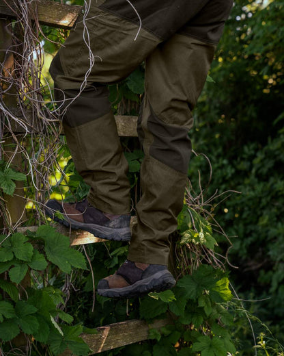 Pine Green Coloured Seeland Key-Point Active II Trousers on outdoor background 