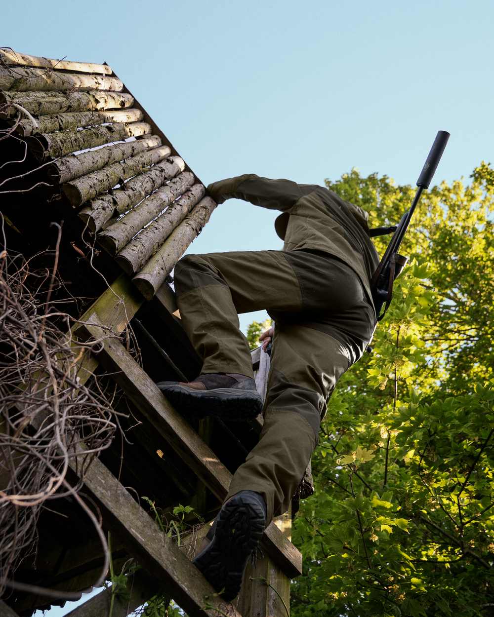 Pine Green Coloured Seeland Key-Point Active II Trousers on outdoor background 