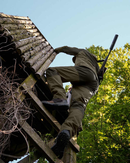 Pine Green Coloured Seeland Key-Point Active II Trousers on outdoor background 