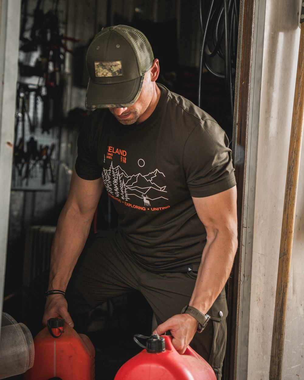 Pine Green Coloured Seeland Landscape T-Shirt on outdoor background 