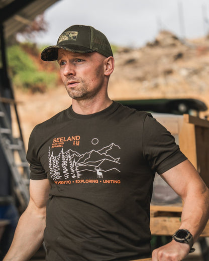 Pine Green Coloured Seeland Landscape T-Shirt on outdoor background 